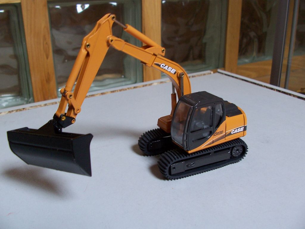 Case cx 130 con benna per pulizia fossi..