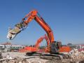 Hitachi Zaxis 350LCN con pinza