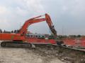 Hitachi Zaxis 350LCN con pinza