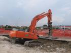 Hitachi Zaxis 350LCN con pinza