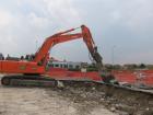 Hitachi Zaxis 350LCN con pinza