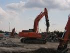 Hitachi Zaxis 350LCN con pinza