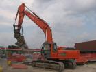 Hitachi Zaxis 350LCN con pinza