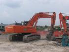 Hitachi Zaxis 350LCN con pinza