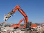 Hitachi Zaxis 350LCN con pinza