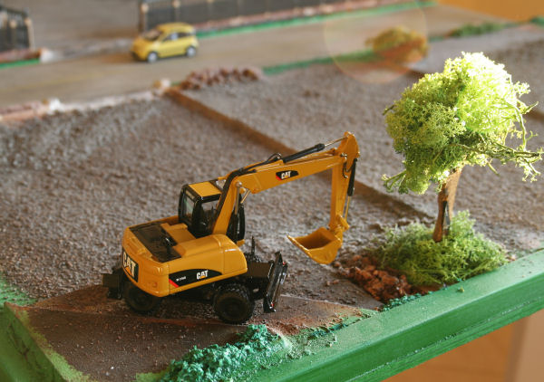 CAT M316 D - 1...escavatore gommato!