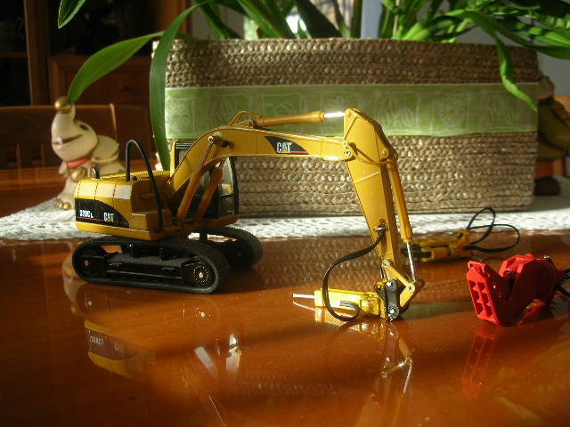 cat320cl con attrezzi