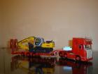 Scania ed escavatore New Holland 215