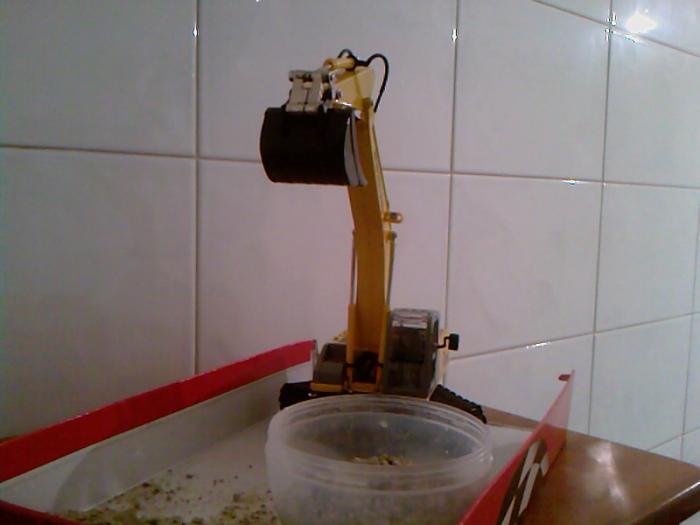 new holland e215 kobelco fine lavoro