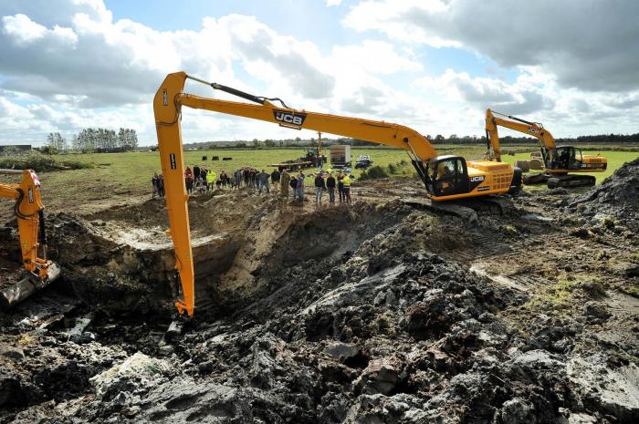 The JCB JS360 excavates the site of the  WWII Lancaster Bomber crash site